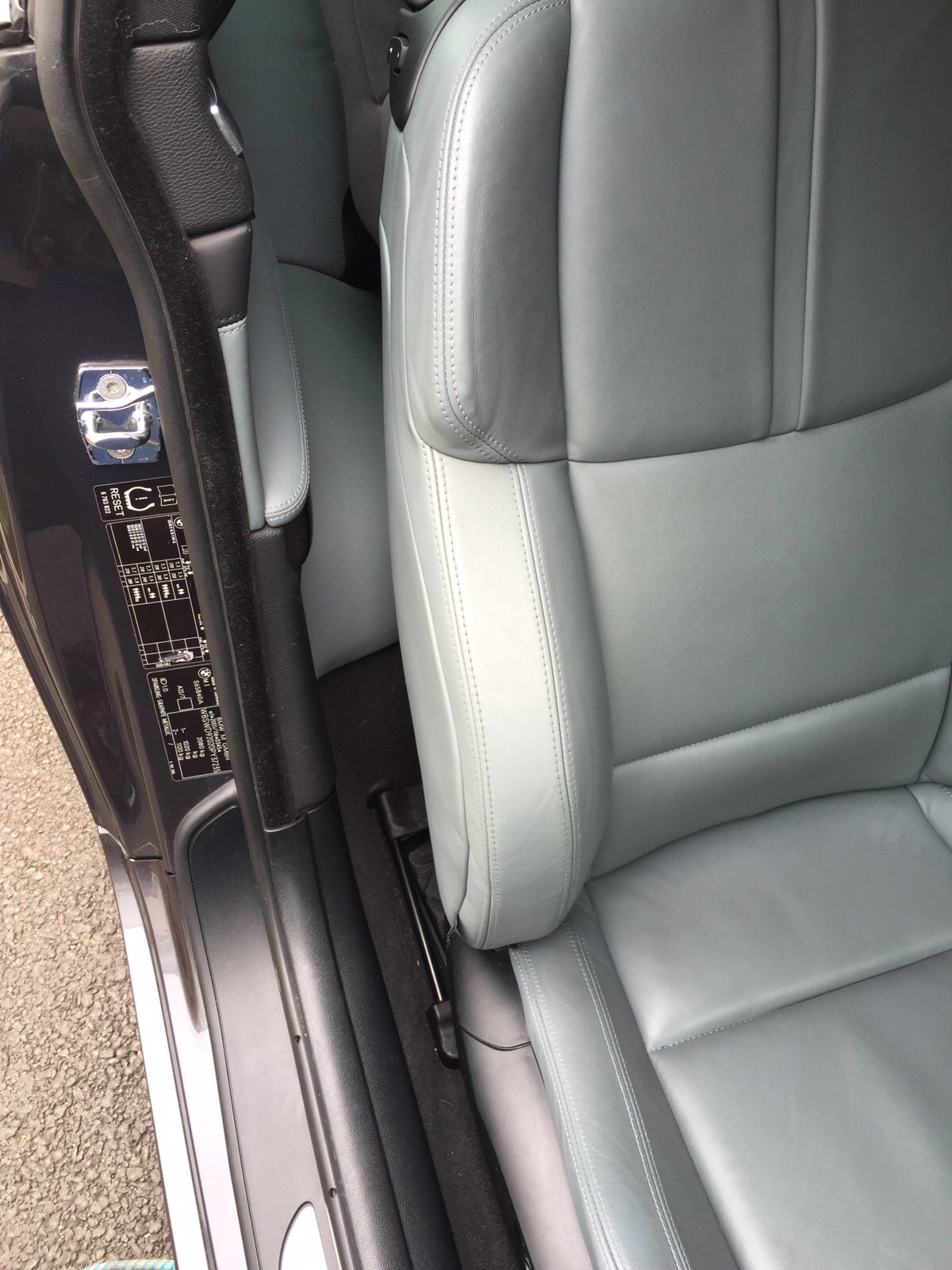 Drivers seat bolster has been cleaned and colour restored.