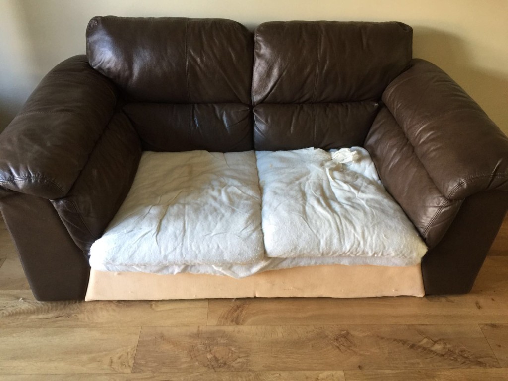 2str sofa which had damage to the seat cover
